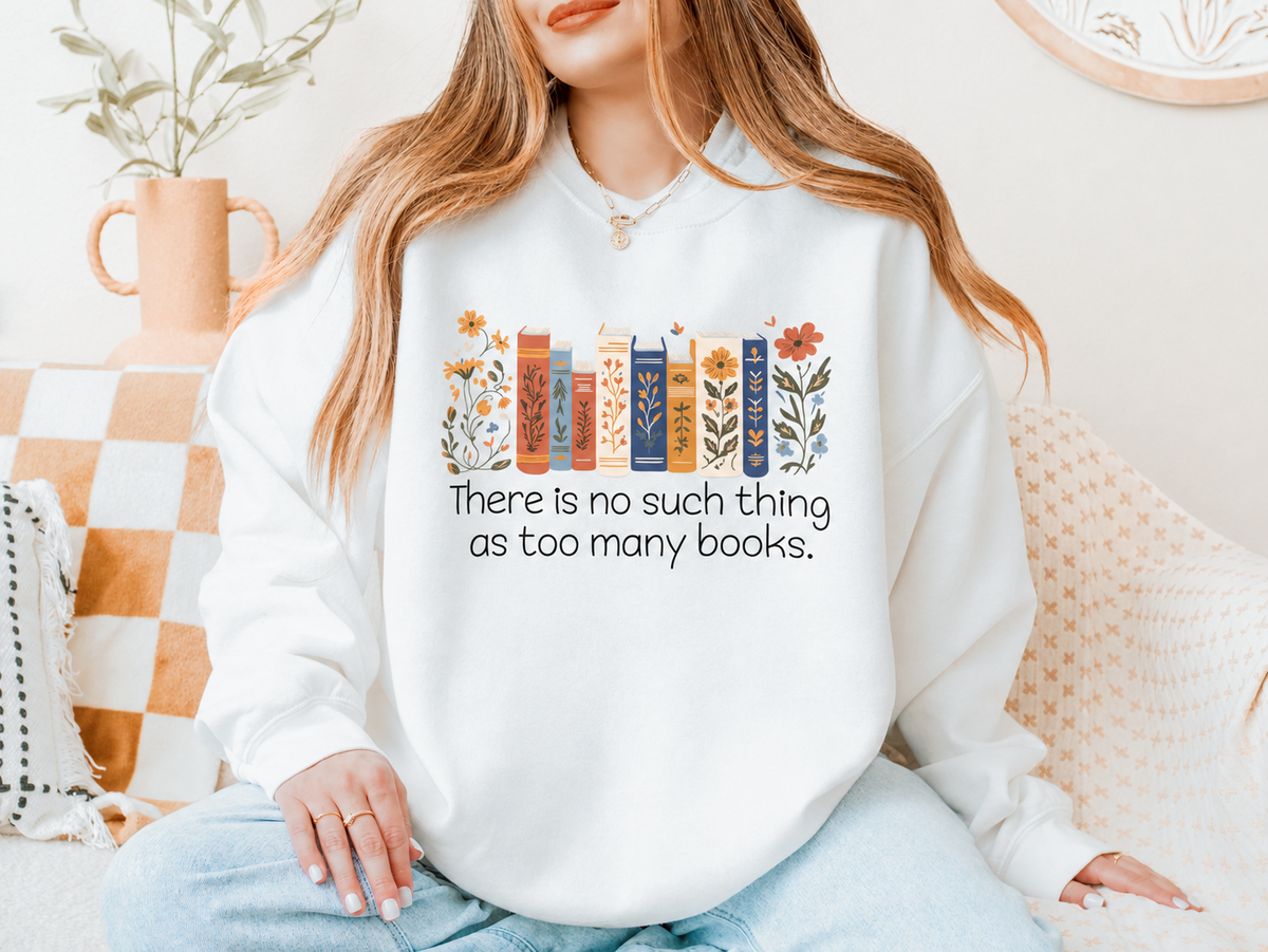 Woman wearing a white floral book-spine sweatshirt