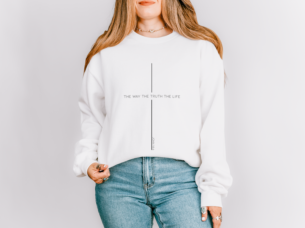 White crewneck sweatshirt with a minimalist cross made from the words The Way The Truth The Life