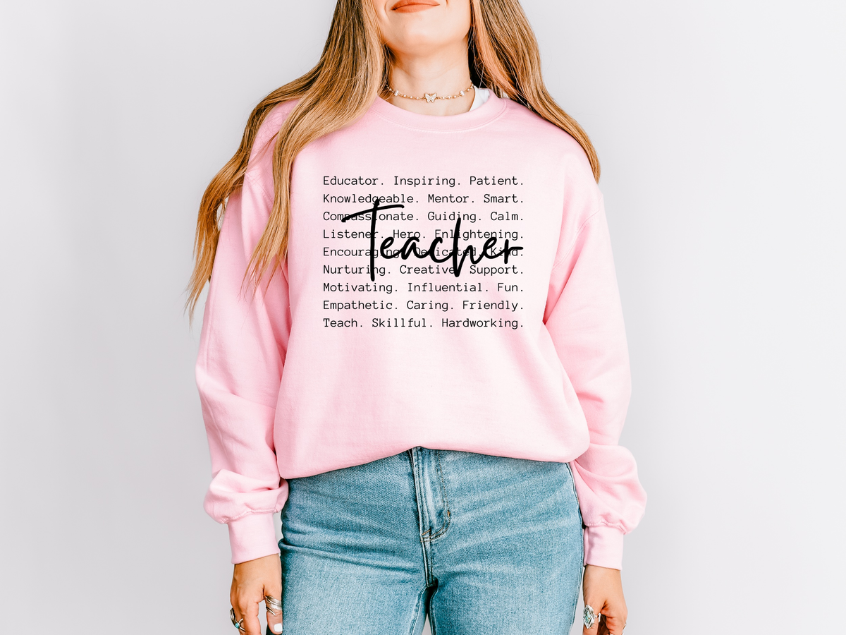 Crewneck sweatshirt with a list of teacher qualities and the word Teacher in script