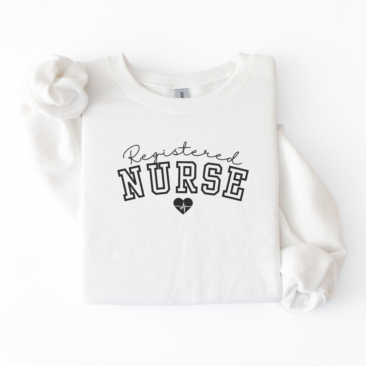 White crewneck sweatshirt flat lay reading Registered Nurse with a heartbeat heart