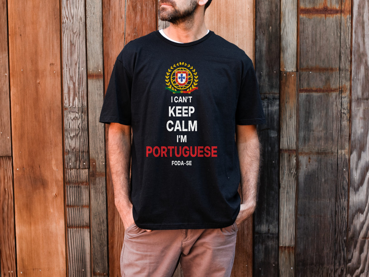 Man wearing a black I Can't Keep Calm I'm Portuguese t-shirt with the Portuguese coat of arms